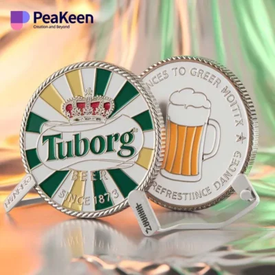 Corporate challenge coin featuring Tuborg beer logo alongside a beer glass, symbolizing camaraderie and celebration.