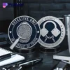 Detective challenge coin displaying a badge with a fingerprint and lock, representing security and investigative prowess.