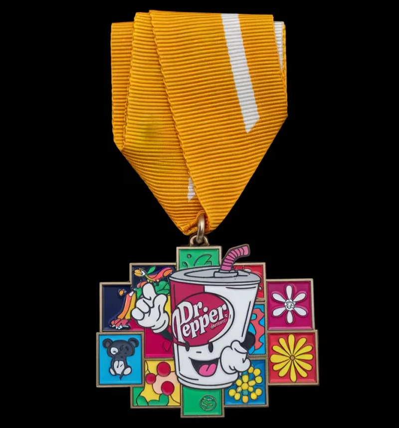 A colorful fiesta medal featuring a cartoon character design, celebrating a festive occasion.