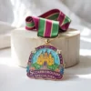 Medal featuring the words "Scarborough Specialties," designed for a fiesta celebration.