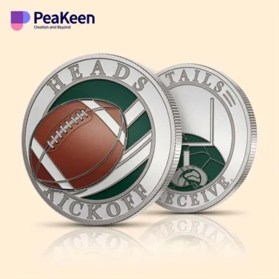 A coin featuring a football design and the phrase "kick off" symbolizing sports enthusiasm and playful competition.