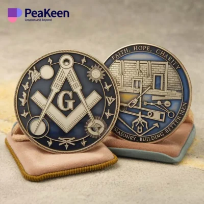 Two freemason challenge coins featuring the masonic emblem, showcasing intricate designs and craftsmanship.