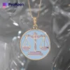 A soft enamel Libra necklace featuring the symbol of justice, elegantly designed for a stylish and meaningful accessory.