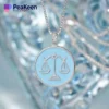 A soft enamel Libra necklace featuring the symbol of justice, elegantly designed for a stylish and meaningful accessory.