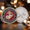 USMC Marine Corps challenge coin featuring the emblem and motto, symbolizing pride and camaraderie among service members.