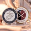 USMC Marine Corps challenge coin featuring the emblem and motto, symbolizing honor and camaraderie among Marines.
