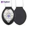 A police badge featuring a chain and key chain, symbolizing police enamel awards and dedication to service.