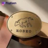 Custom engraved metal buckle for men, featuring a unique design, ideal for rodeo enthusiasts and stylish accessories.