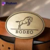 Custom engraved horse logo on a rodeo brass belt buckle, showcasing a unique and stylish design for equestrian enthusiasts.