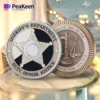 A sheriff's challenge coin rests on a glass table, showcasing its detailed design and emblematic significance.