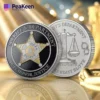Sheriff challenge coin displayed against a gold background, highlighting its intricate design and emblematic features.