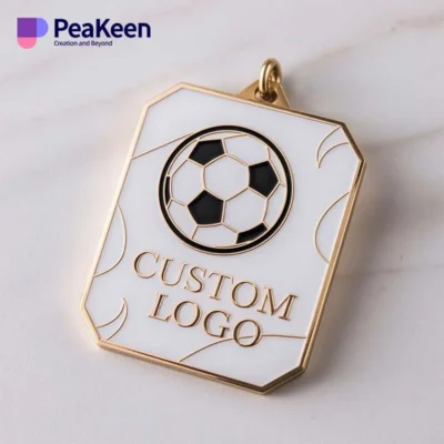 Unique soccer ball pendant with a custom logo, designed as a medal to honor soccer accomplishments and milestones.