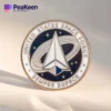 A challenge coin featuring the US Space Force logo, symbolizing commitment to space operations and national security.