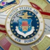 United States Air Force emblem displayed on a squadron coin, symbolizing pride and service in the military.