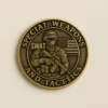SWAT and tactics badge displayed on a challenge coin, symbolizing law enforcement and tactical excellence.