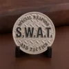 SWAT tactical badge featuring a detailed design, often used as a challenge coin for commemorative purposes.