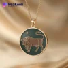 Elegant gold-plated necklace showcasing a bull, made with soft enamel, representing the Taurus astrological sign.
