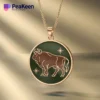 Elegant gold-plated necklace showcasing a bull, made with soft enamel, representing the Taurus astrological sign.