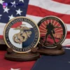 A collection of USMC challenge coins displayed together, showcasing their unique designs and military significance.
