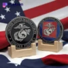 A collection of USMC challenge coins displayed together, showcasing their unique designs and military significance.