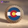 A pin featuring the Colorado flag, showcasing the state's vibrant colors and iconic design.