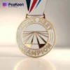 Medal featuring the inscription "Track Meet Champion," symbolizing athletic achievement in track events.