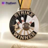 A bowling medal showcasing the phrase "Strike Winner," symbolizing excellence in bowling performance.