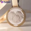 A gold cheerleading medal with a vibrant ribbon, symbolizing achievement and excellence in the sport.