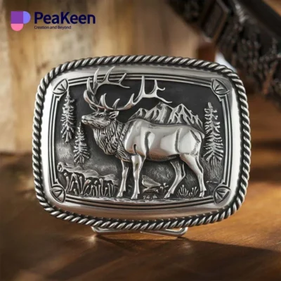 Elk belt buckle featuring a detailed design of a deer alongside a tree, showcasing nature-inspired craftsmanship.