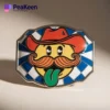 A whimsical blue and white belt buckle showcasing a cowboy hat and mustache, ideal for those who love funny accessories.
