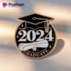 Graduation pin featuring the words "2024 Graduate" in bold lettering, symbolizing academic achievement.