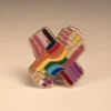 A rainbow pride pin showcasing two hands, embodying love and support for the LGBT community.