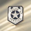 Badge displaying "Years of Service" text, symbolizing dedication and commitment, often used as a service pin.