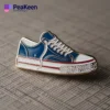 Blue and white sneaker pin featuring the word "peaken," designed for shoe enthusiasts.