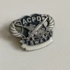 Badge displaying the words "ACPD SWAT," representing a special weapons and tactics unit.