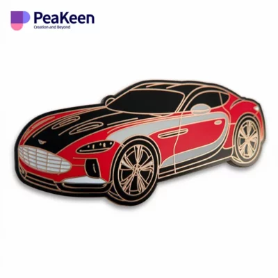 A sleek red and black sports car pin, showcasing a dynamic design that captures the essence of speed and style.