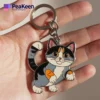 A charming metal keychain showcasing a cat face, ideal for adding a playful touch to your keys.