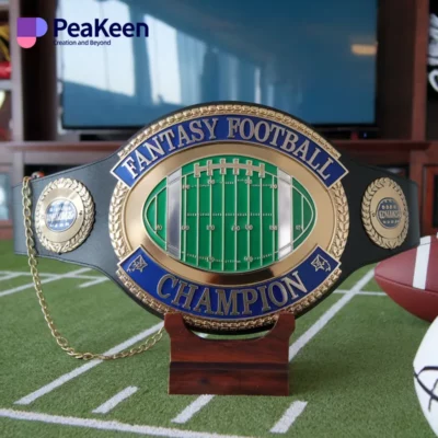 A decorative fantasy football championship belt showcasing a gleaming finish and detailed engravings, symbolizing victory.