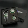 Golf gift set featuring a stylish golf ball marker and a premium golf ball, elegantly packaged in a gift box.