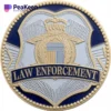The image showcases a law enforcement challenge coins reflecting the commitment of officers to their communities.