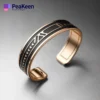 Soft enamel peeken bracelet featuring a stylish design in black and gold plated metal, perfect for any occasion.