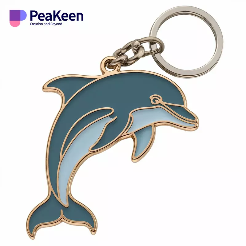 Metal dolphin keychain against a vibrant blue background, showcasing its sleek design and playful shape.