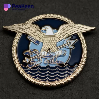 Navy SEAL challenge coin badge displaying an eagle alongside a boat emblem.