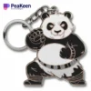 Cute black and white panda keychain made of soft enamel, ideal for adding a playful touch to your keys or bag.
