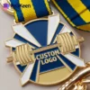 Custom gold medal for weightlifting featuring a blue ribbon, symbolizing achievement and excellence in sports.