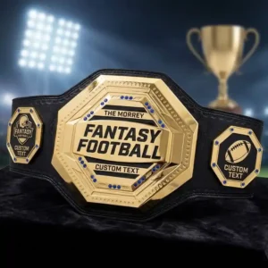 Gold custom fantasy football champion belt with personalized text plates, displayed in a stadium trophy setting