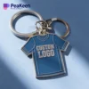 Custom jersey keychain featuring a unique logo design, perfect for personal use or promotional giveaways.
