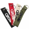 Three woven keychains in different colors, each featuring the word "ovo" prominently displayed.