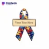Custom autism awareness ribbon pin designed to promote understanding and support for individuals with autism.