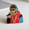 A hip hop-themed pin illustrating a rapper with headphones, capturing the essence of urban music style.